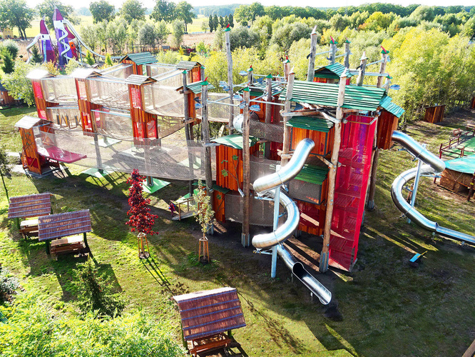 Spiral slides for playgrounds